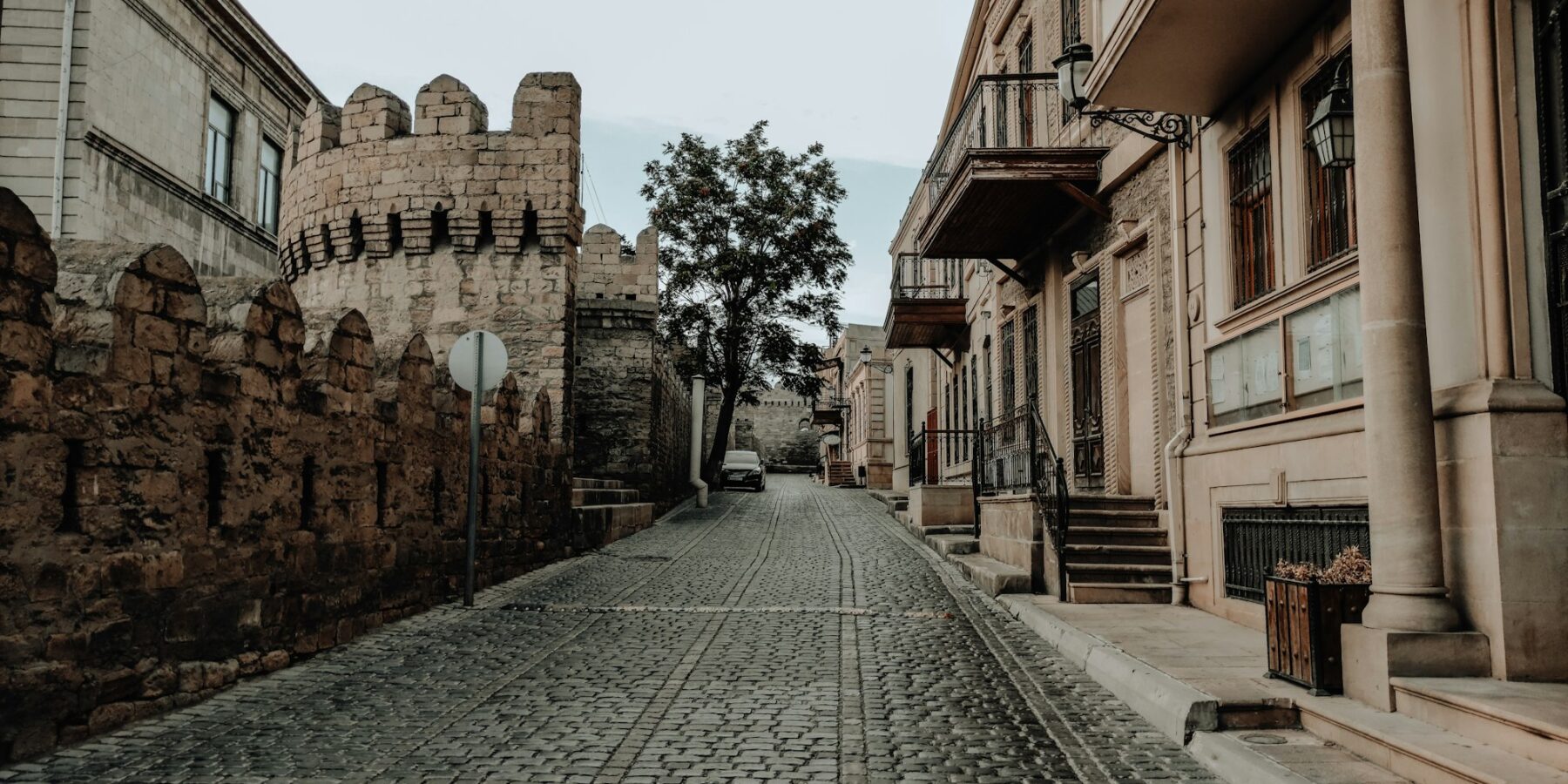 A narrow stone alley inside the walled Old City of Baku
